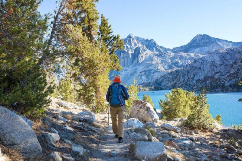 A man walking beside a lake in Nevada, USA